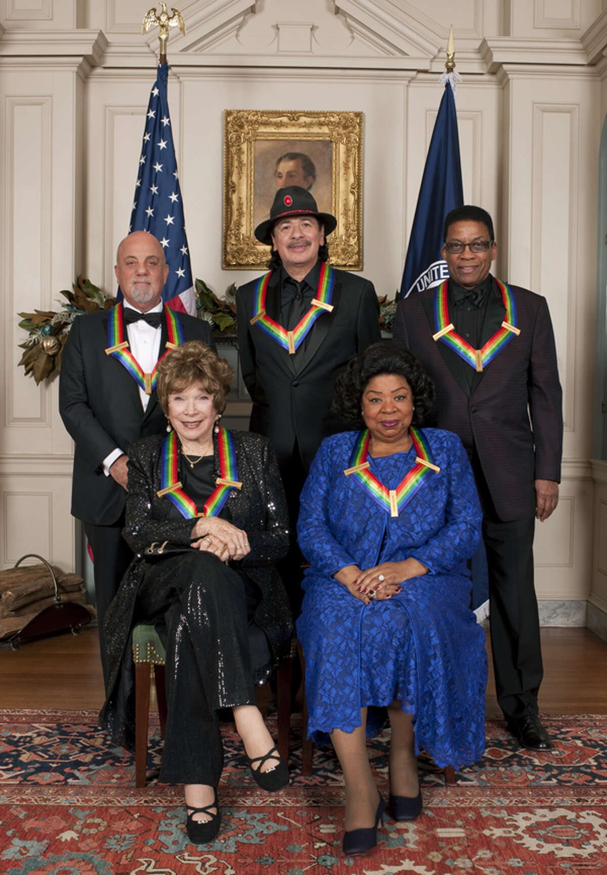 WASHINGTON - DECEMBER 7: The 36th Annual Kennedy Center Honors -- (From left to right) Seated: Actress Shirley MacLaine, opera singer Martina Arroyo, Standing: pianist, singer and songwriter Billy Joel, musician and songwriter Carlos Santana and pianist, keyboardist, bandleader and composer Herbie Hancock will receive honors for 2013 on THE 36TH ANNUAL KENNEDY CENTER HONORS, to be broadcast Sunday, Dec. 29 (9:00-11:00 PM, ET/PT) on the CBS Television Network.