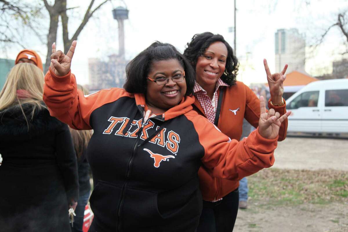Fans turn out to tailgate before the Texas Longhorns take on the Oregon Ducks at the 2013 Alamo Bowl on Dec. 30, 2013.