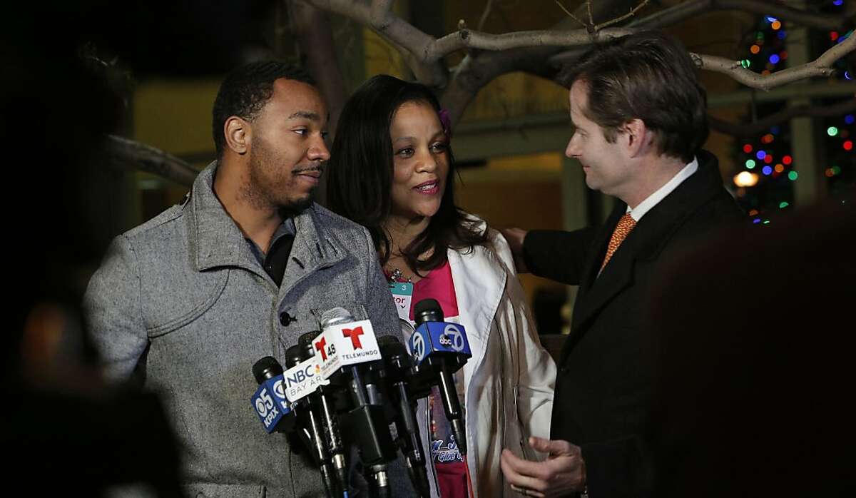 Jahi's Uncle Omari Sealey, (left) Sandra Chatman, her grandmother and the family attorney Christopher Dolan after speaking to the news media about the court ordered extension while in front of Children's Hospital in Oakland, Ca., on Monday Dec. 30, 2013. 13-year-old Jahi McMath was slated to be removed from a ventilator at 5pm this afternoon but a court order has extended the deadline for the removal of the ventilator until 5pm January 7, 2014.