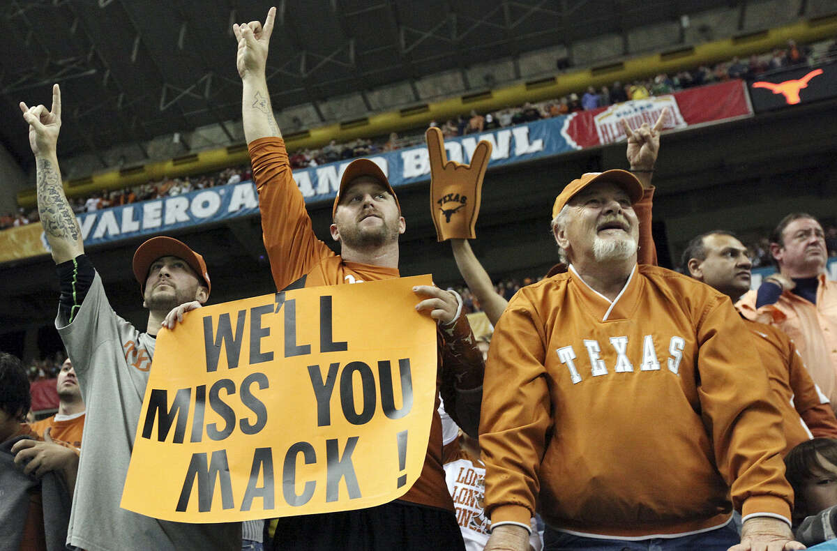 Longhorns fans show their appreciation for coach Mack Brown during the first half of the Valero Alamo Bowl on Monday night at the Alamodome. Oregon went on to win 30-7.