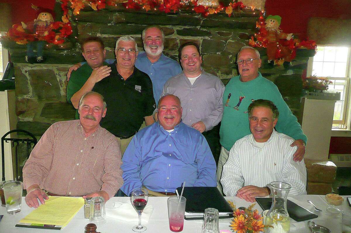 Members of the Umbrella Club of Lower Fairfield County, a club that whose mission is "to help people," include, seated from left: Stamford residents Hank Anderson, secretary; Bruce Moore, outgoing president; and Mike Mezzapelle, treasurer. In the back row, from left, are: Stamford resident Mike Zody, founder and Greenwich resident Jim Pucci, Tom Heide of Wilton, Scott Kelly of Norwalk, and Greenwich resident and founder Peter Orrico.