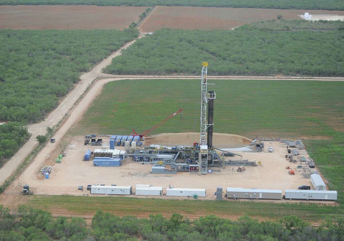 An aerial view shows drilling activity at a Carrizo Oil & Gas wells in northern LaSalle County.