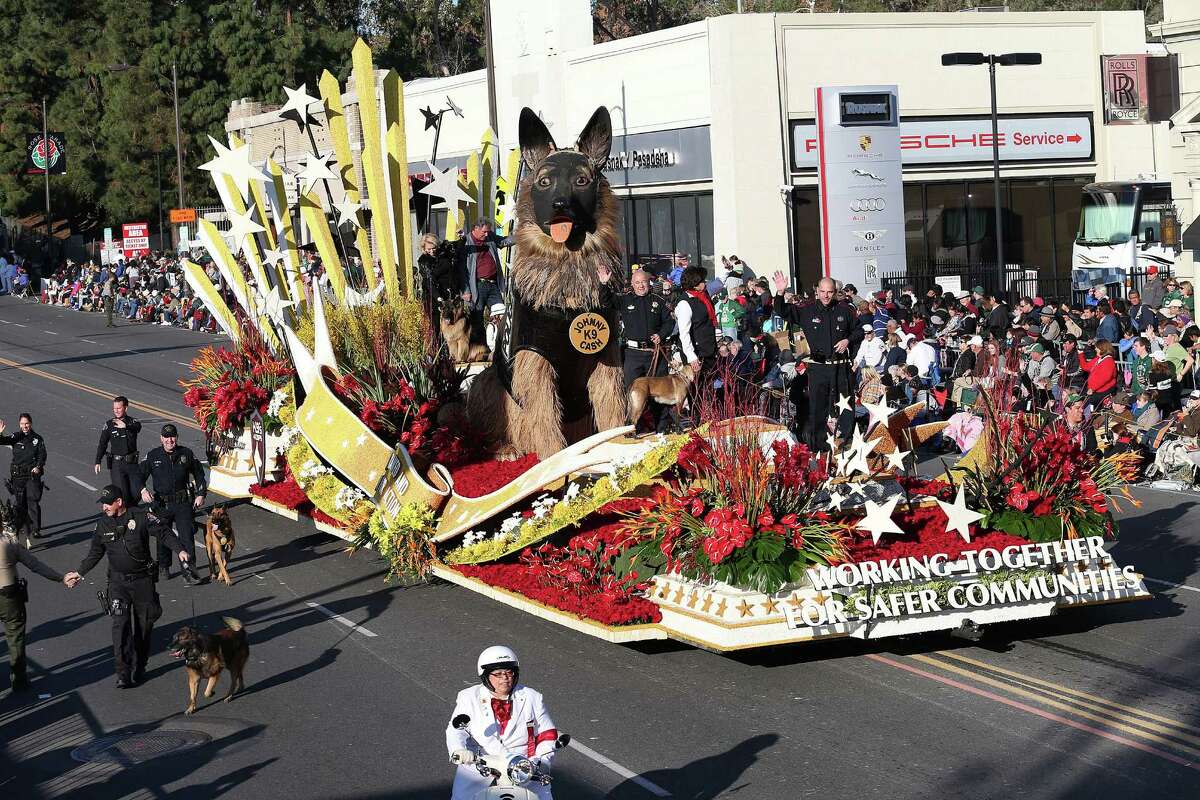 PASADENA, CA - JANUARY 01: The K9s4Cops float on the parade route during the 125th Rose Parade on January 1, 2014 in Pasadena, California.