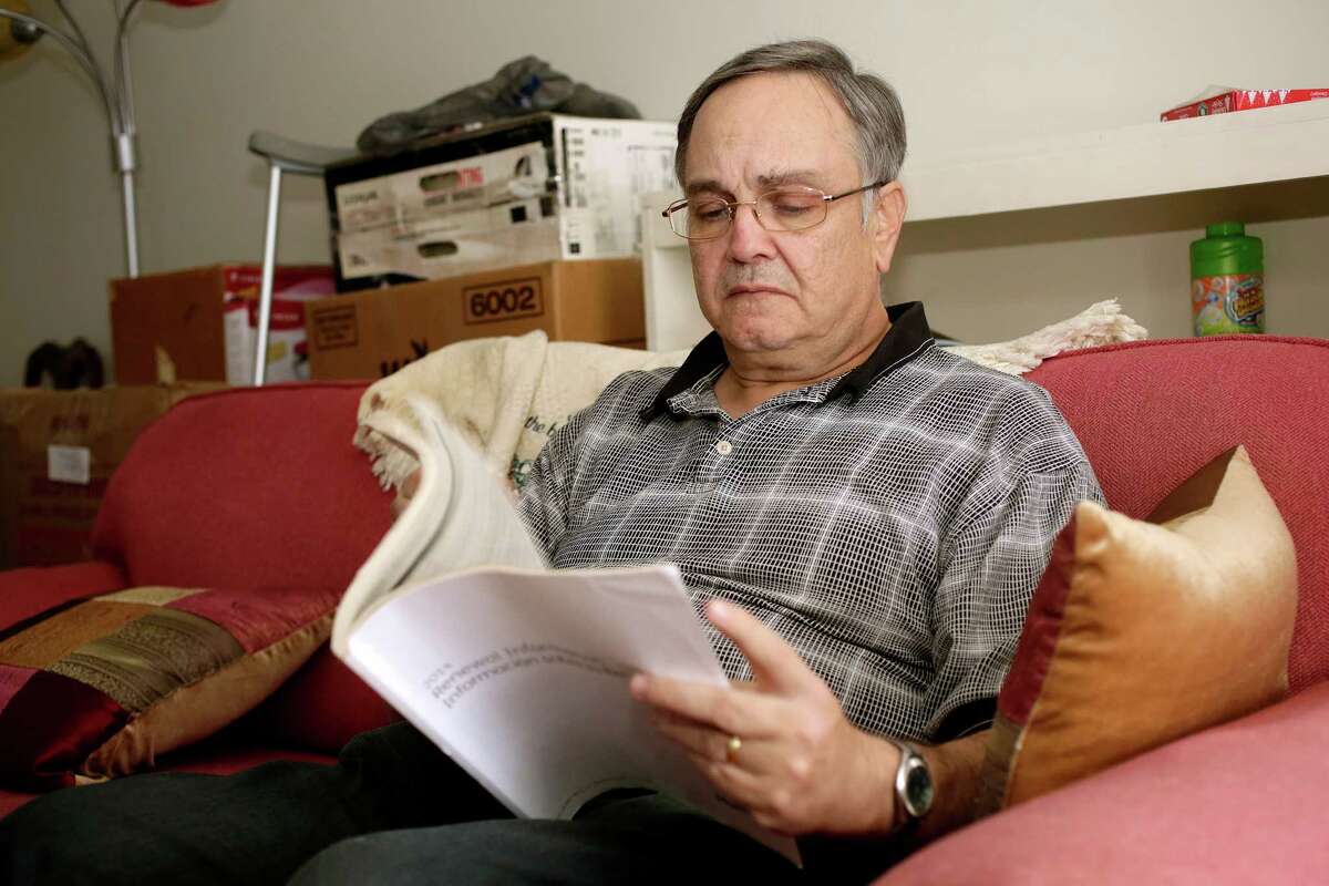 Howard Kraft looks over healthcare information in his Lincolnton, N.C. home Monday, Dec. 30, 2013. All things good, bad and unpredictable converge Jan. 1 for President Barack Obamaâs health care overhaul as the lawâs major benefits take effect, along with an unpopular insurance mandate and a real risk of more nerve-wracking disruptions to coverage. For some, the changes bring big improvements, including Kraft. A painful spinal problem left him unable to work as a hotel bellman. But heâs got coverage because federal law now forbids insurers from turning away people with health problems. âI am not one of these people getting a policy because Iâm being made to,â Kraft said. âI need one to stay alive.â (AP Photo/Nell Redmond)