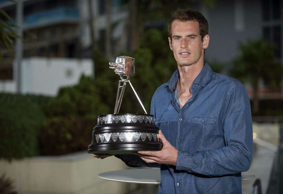 In this photo made available by the BBC, British Broadcasting Corporation, British tennis player Andy Murray poses with his award, in Miami, Florida, Sunday, Dec. 15, 2013. Wimbledon Champion Andy Murray was named as the BBC Sports Personality of the Year 2013. (AP Photo/Josh Ritchie)
