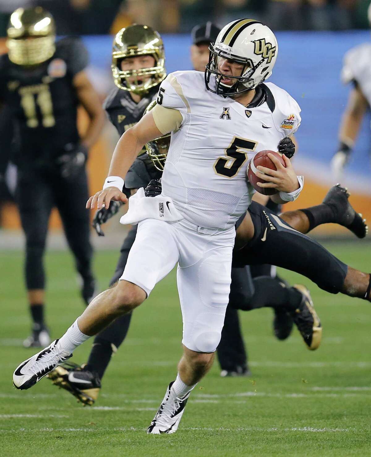 UCF's Blake Bortles hurt the Baylor defense with his feet (more than 11 yards per rush) and arm (three TD passes).