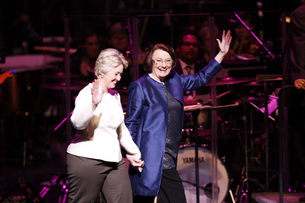 Houston Mayor Annise Parker celebrates with her partner Kathy Hubbard at her inauguration at the Wortham Theater Center Jan. 2, 2014.
