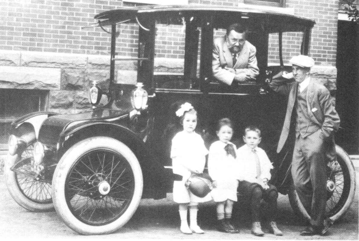 Noted electrical engineer Charles Steinmetz in his 1914 Detroit Electric, with grandchildren (left to right) Midge, Billy and Joe, and his adopted son, Joseph Hayden in this undated photograph. (Union College archives)