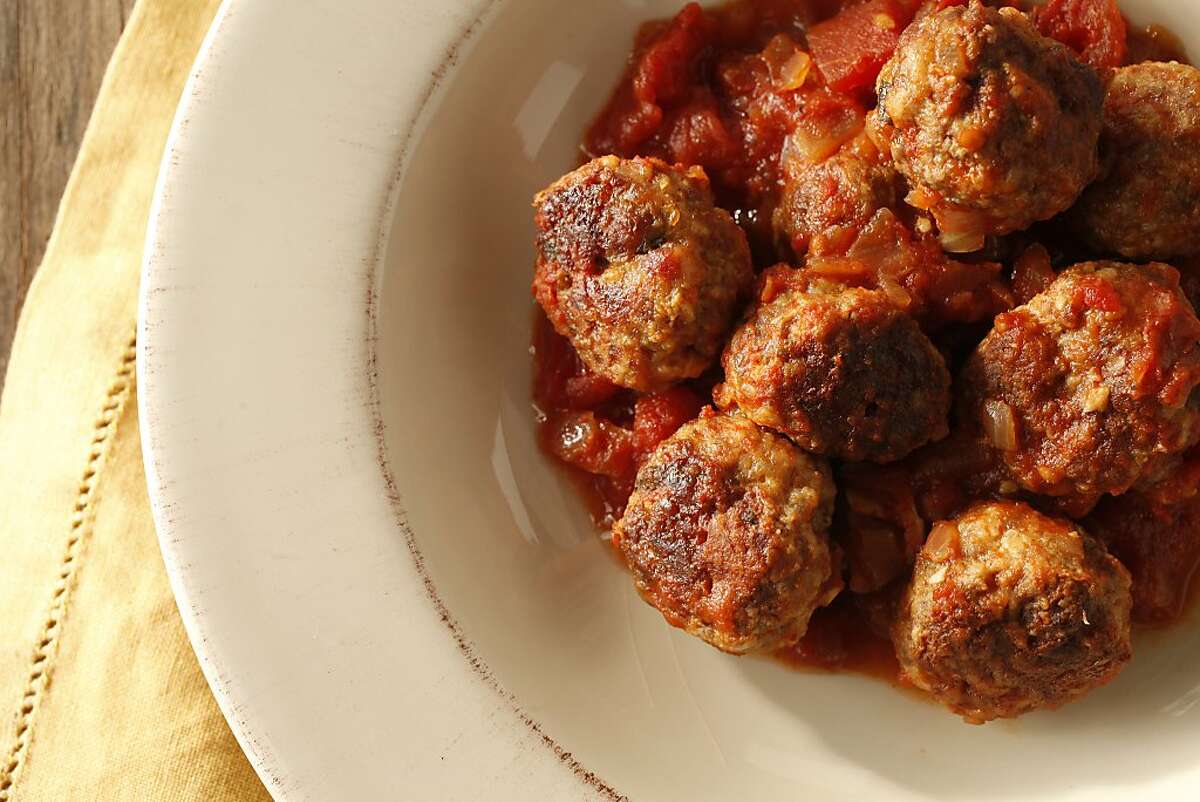 Albondigas with Sherry Tomato Sauce (Brett Emerson), as seen in San Francisco, California on Wednesday, December 18, 2013. Food styled by Lauren Reuthinger.