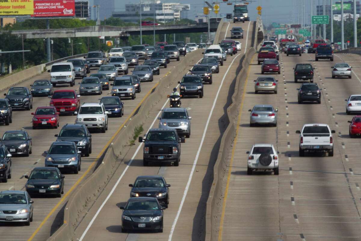 Drivers head northwestward in the HOV lane on U.S. 290. Starting Monday, solo drivers in local toll lanes will pay higher fees and have less access.