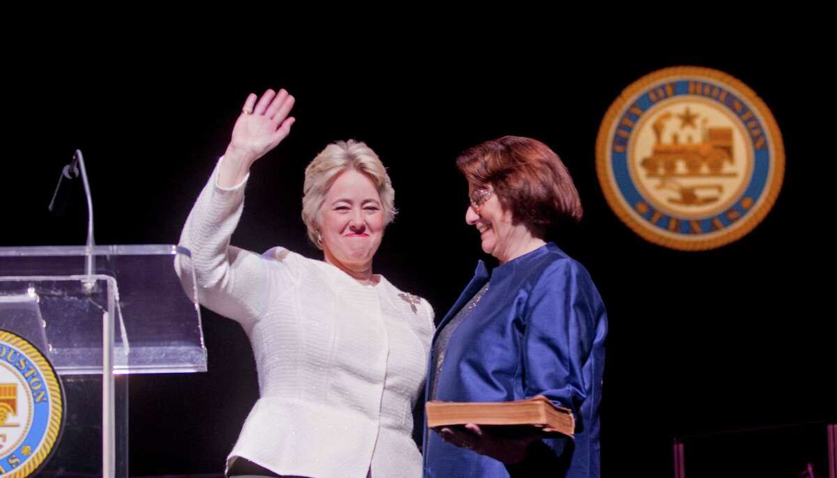 Mayor Annise Parker takes the oath of office for a third and final term Thursday with her partner, Kathy Hubbard, at her side.