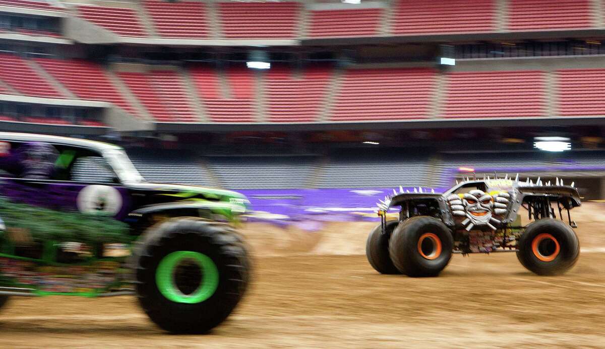 Max-D driven by Tom Meents gives a demonstration for the media in Reliant Stadium Friday, Jan. 3, 2014, in Houston. The Monster Jam event Saturday features 24 monster trucks including Grave Digger, Scooby-Doo, Toro Loco, and Mohawk Warrior. The trucks will compete in a race and freestyle event.