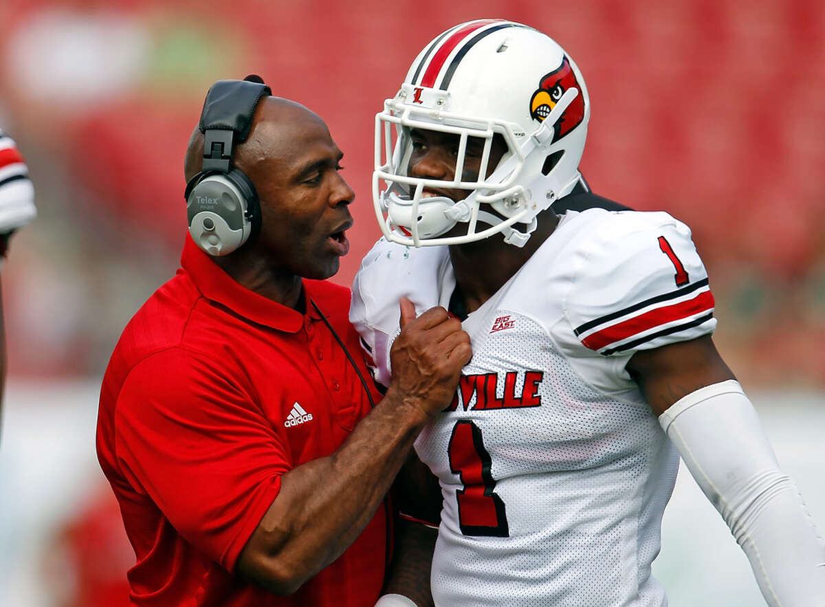 Louisville's Strong to take over as UT coach