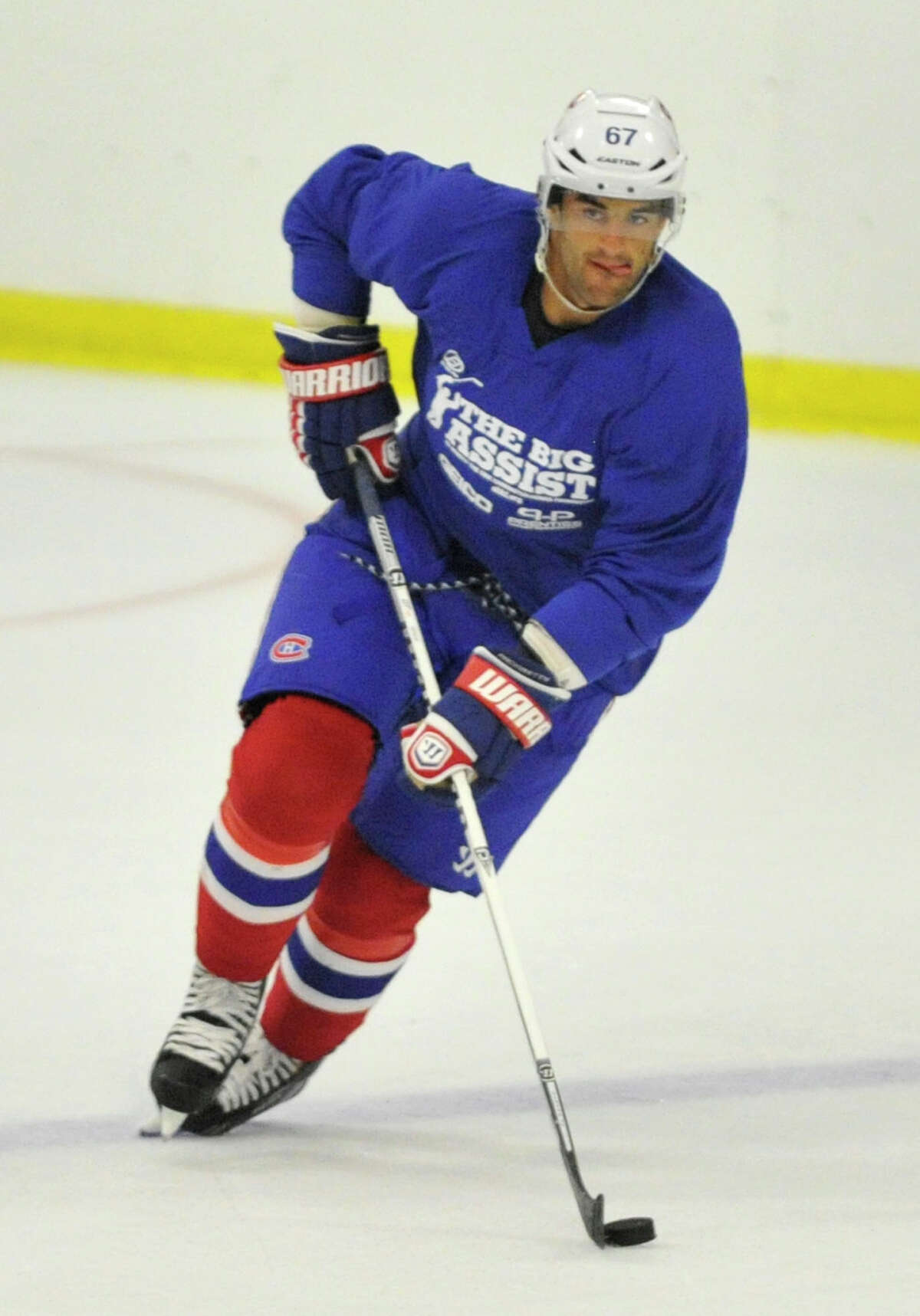 Max Pacioretty, of the Montreal Canadiens, skates with the puck during the Big Assist V charity hockey game at Terry Conners Rink in Stamford on Wednesday, July 10, 2013. Proceeds benefit the Obie Harrington-Howes Foundation.