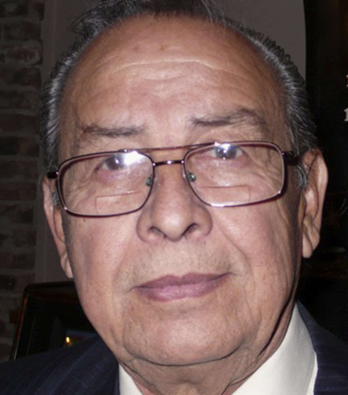 Ray Madrigal, 71, of Corpus Christi, is a candidate for governor in the March 4 Democratic primary. The part-time municipal court judge in the tiny coastal town of Seadrift is the lone primary opponent to heavily-favored gubernatorial candidate Wendy Davis. HeÂÃÃ?–s shown in San Antonio campaigning at a Bexar County Democratic Party event on Dec. 17.