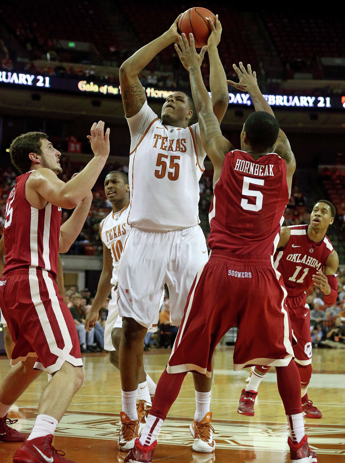Texas center Cameron Ridley takes a jumper in the lane in the first half as the Longhorns play Oklahoma in the Erwin Center on January 4, 2014.