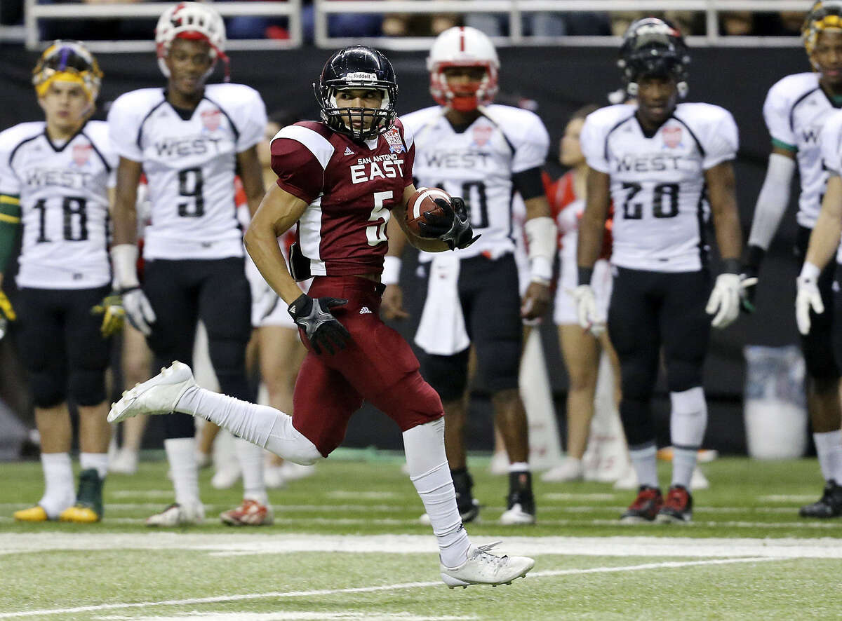 Steele High senior Justin Stockton, headed to Texas Tech, scores one of his three kickoff-return touchdowns (five overall) in Saturday's S.A. Sports All-Star Football Game.