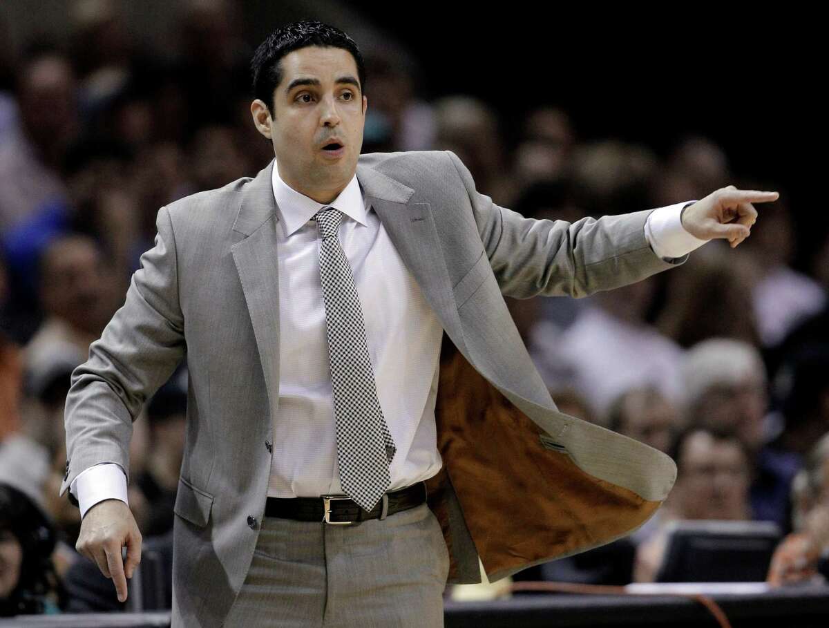 Portland Trail Blazers coach Kaleb Canales talks to his players during the first quarter of an NBA basketball game against the San Antonio Spurs, Monday, April 23, 2012, in San Antonio. (AP Photo/Eric Gay)