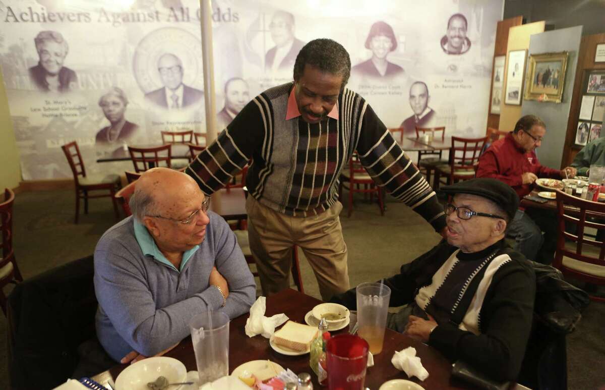 Charles Andrews, Tommy Moore and Dr. Robert Hilliard speak during lunch Jan. 2. Moore said Andrews was his first customer. The restaurant closed Saturday after unsuccessful negotiations with financiers.