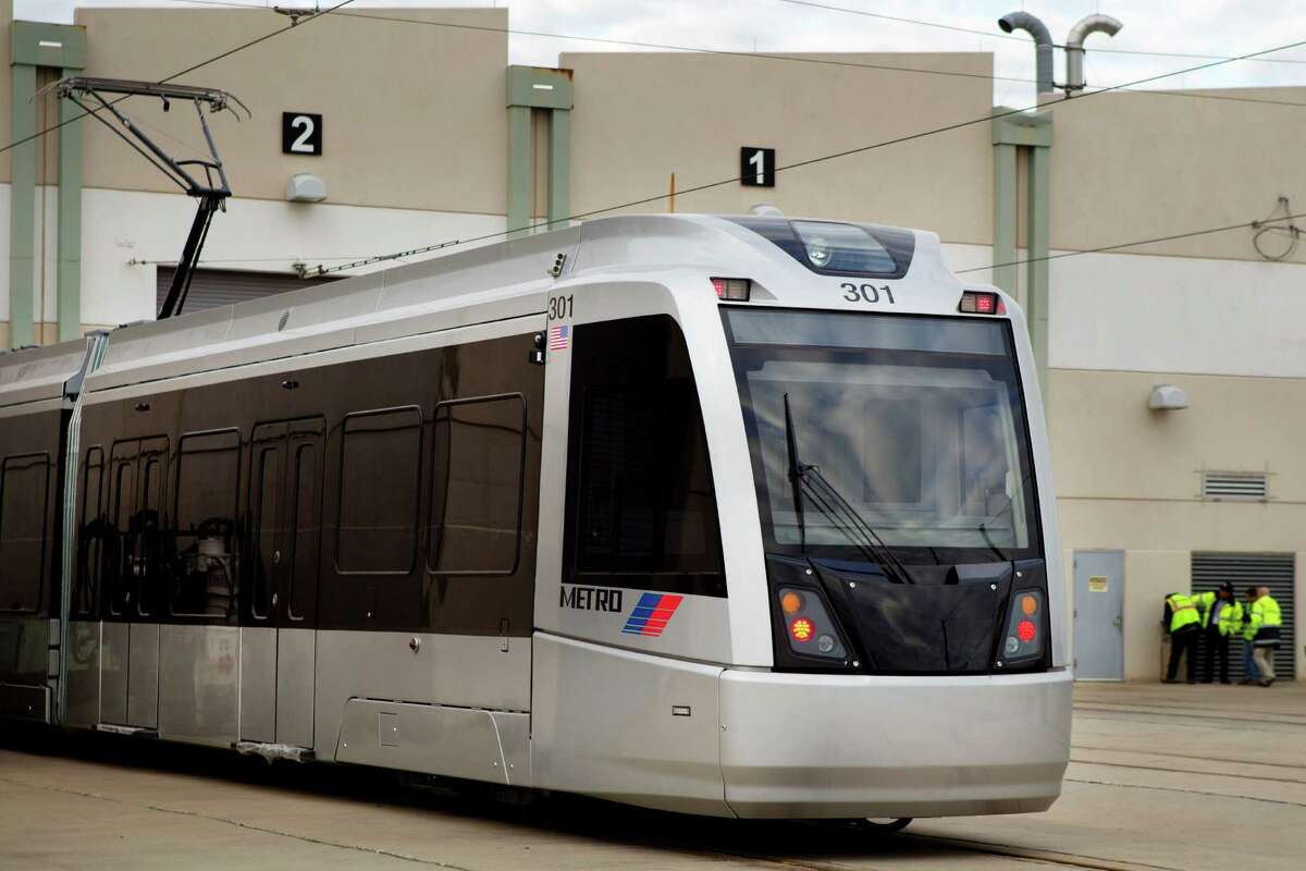 The first of Metro's 39 new light railcars exceeds weight specifications and has yet to pass a water test.
