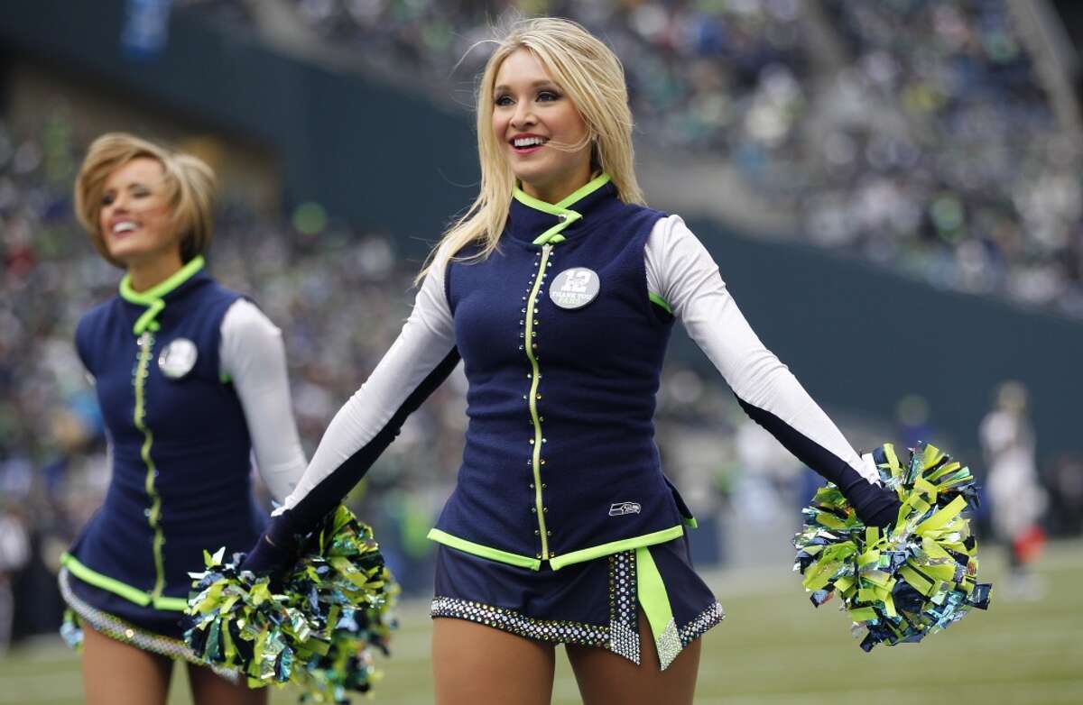 The Sea Gals cheerleades wear combat boots in honor of veterns before the  Seattle Seahawks against the New York Giants NFL football game, Sunday,  Nov. 7, 2010, in Seattle. (AP Photo/Ted S.