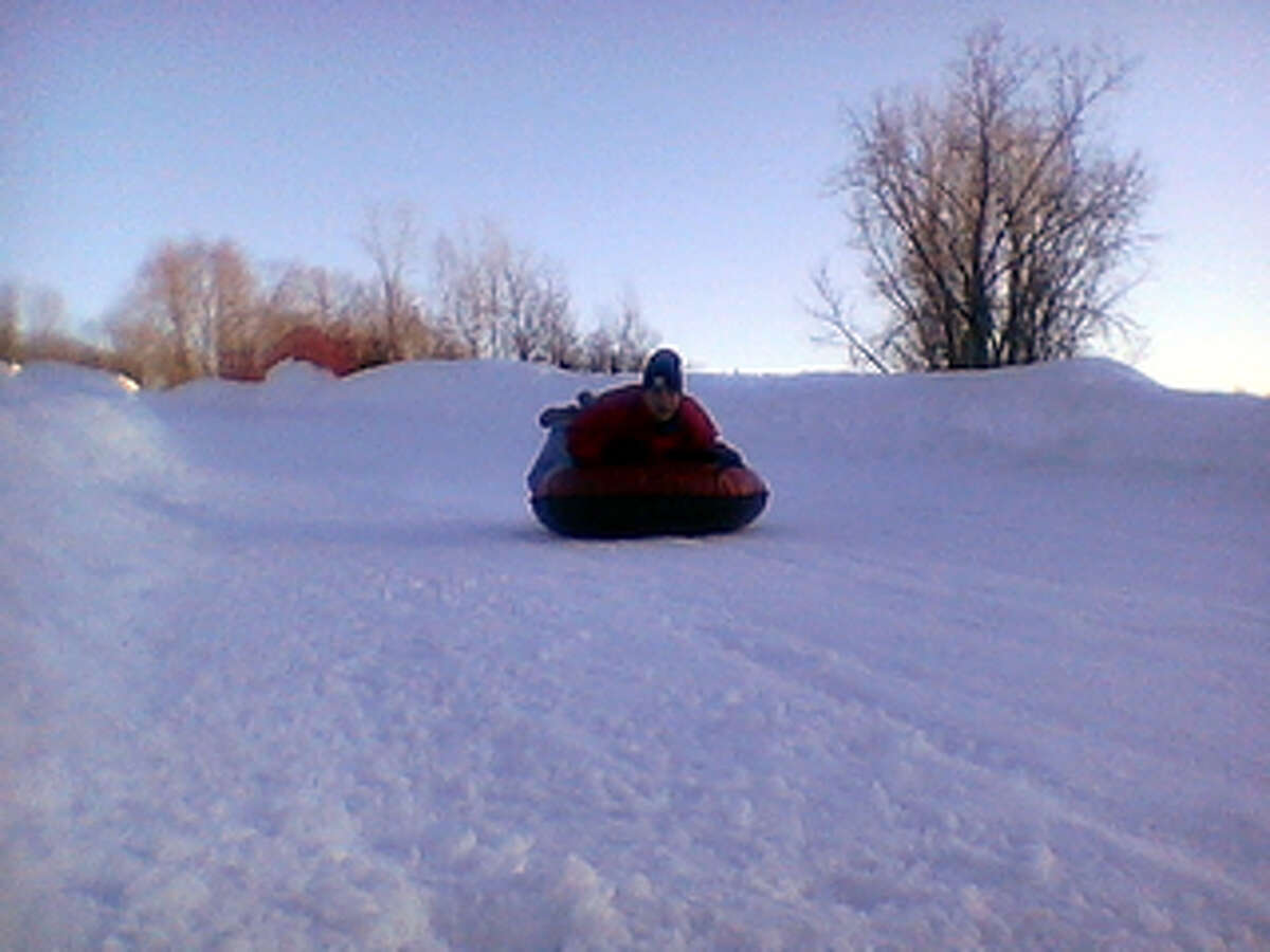 Go Tubing at Woodbury Ski Area 785 Washington Rd., Woodbury, CT 06798 The sport is simple, a blast and a great wintertime activity. Just hop onto an inflated tube and you're off. Woodbury Ski Area has 15 snow tubing runs offering almost a mile of tubing trails, three parks, and four lifts.