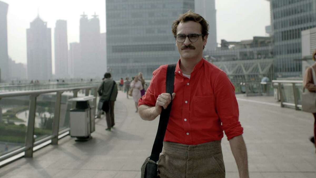 Caption: JOAQUIN PHOENIX as Theodore in the romantic drama "HER," directed by Spike Jonze, a Warner Bros. Pictures release.