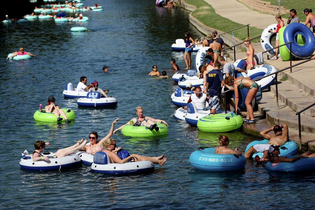 Tubers hit the Comal River in New Braunfels on Monday Sept. 3, 2012.