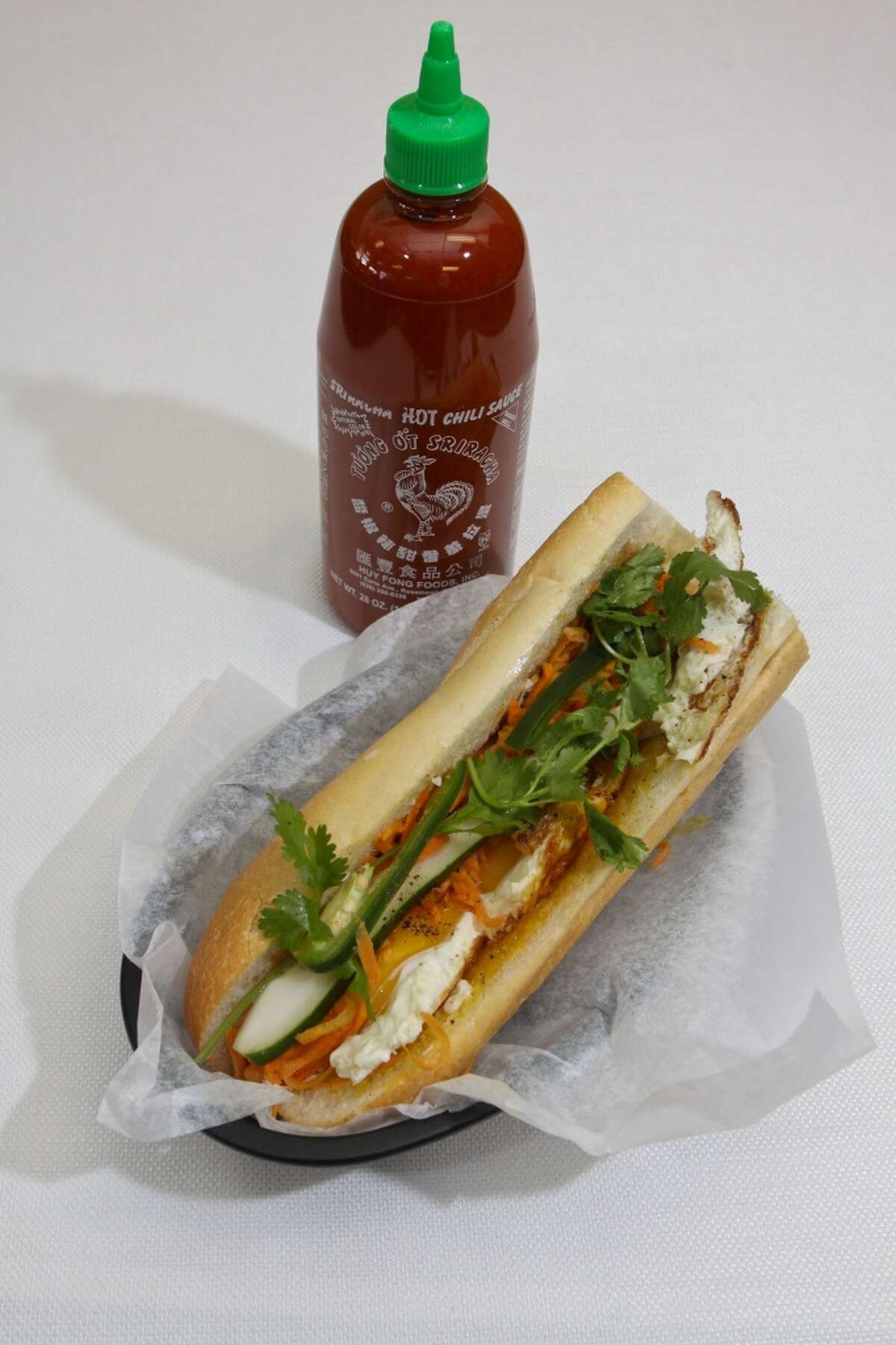 Egg sandwich and Sriracha sauce at Cafe TH