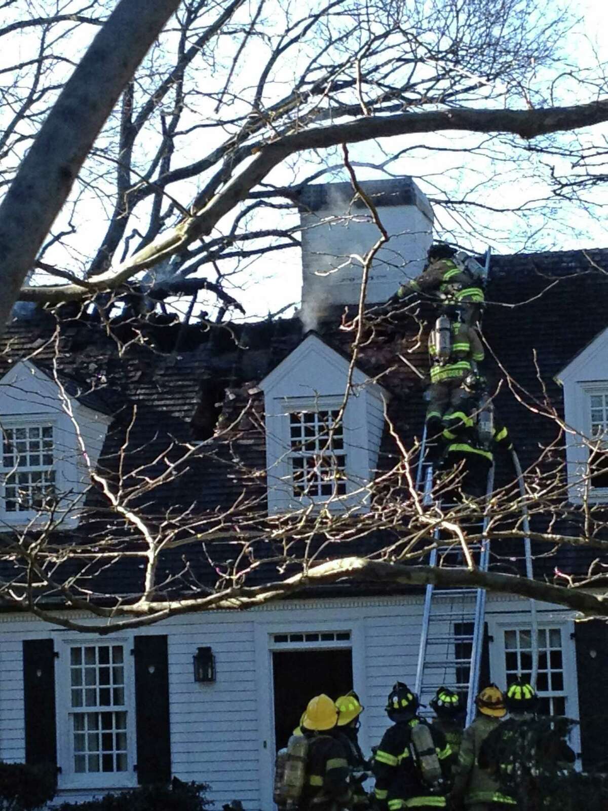 Darien home badly damaged in fire