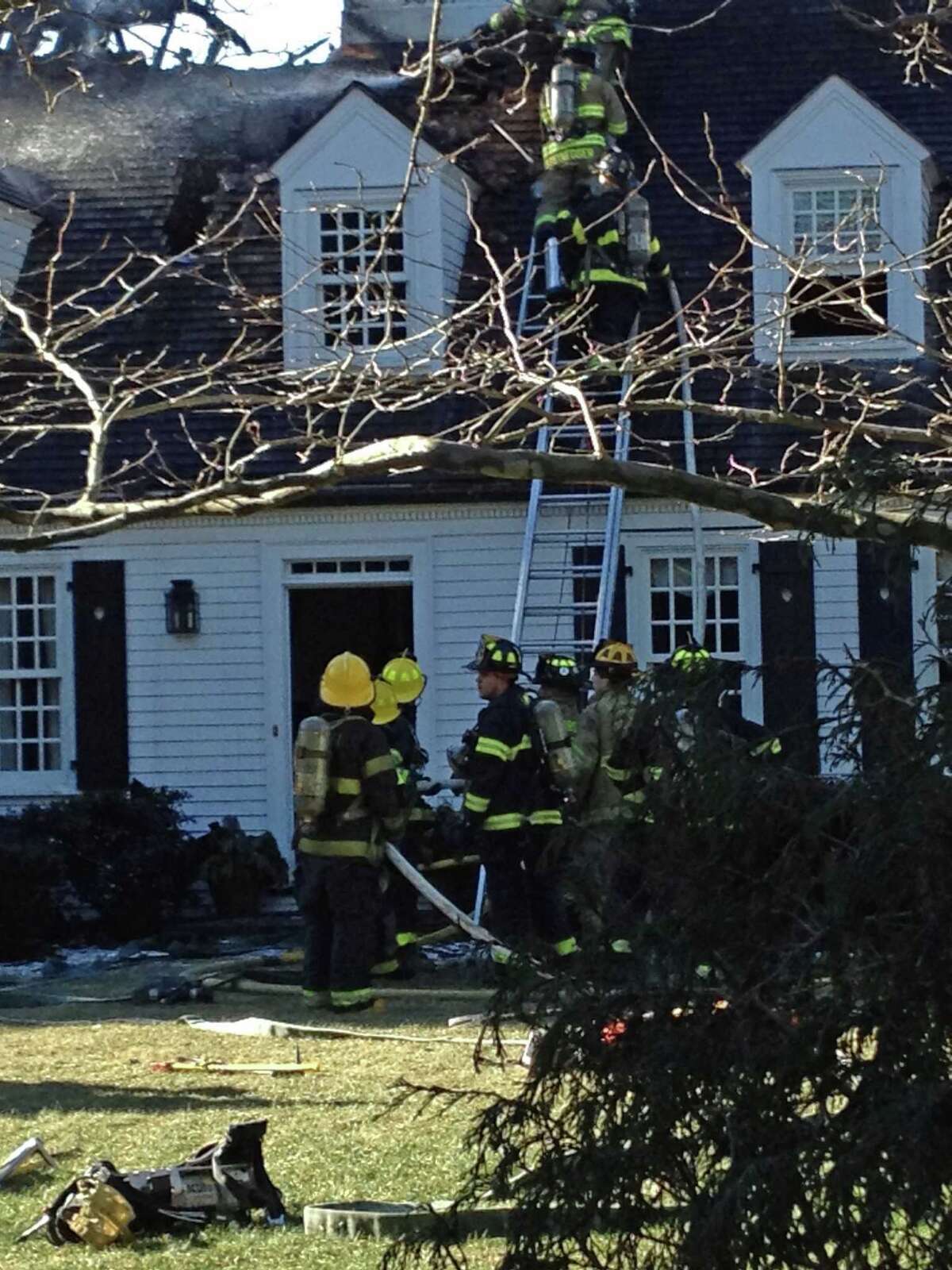 Darien home badly damaged in fire
