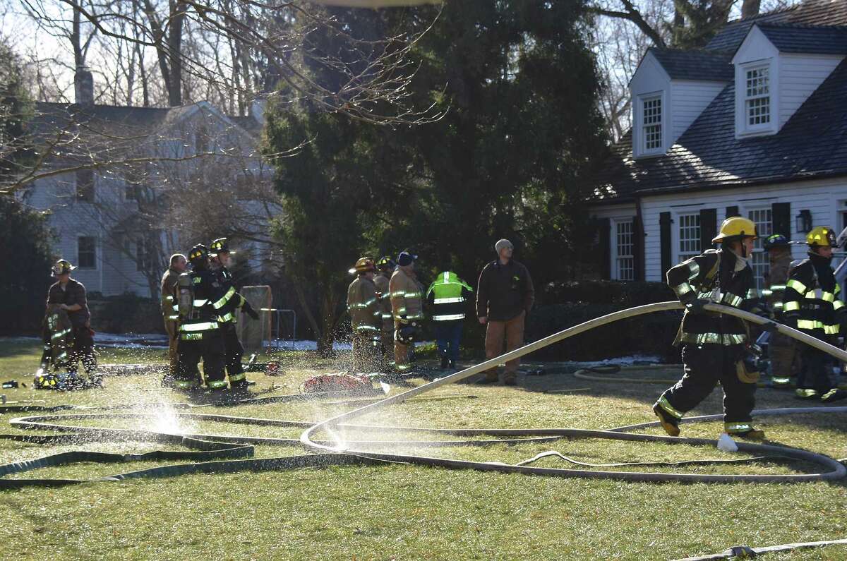 Darien home badly damaged in fire