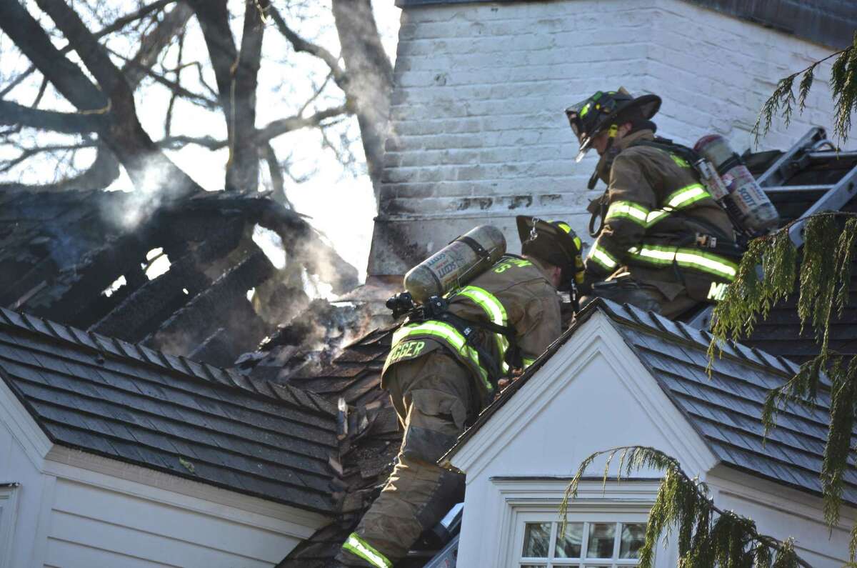 Darien home badly damaged in fire