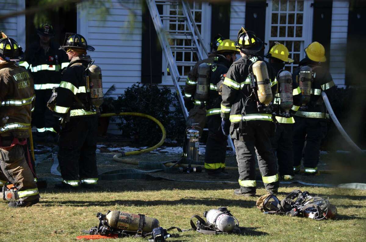 Darien home badly damaged in fire