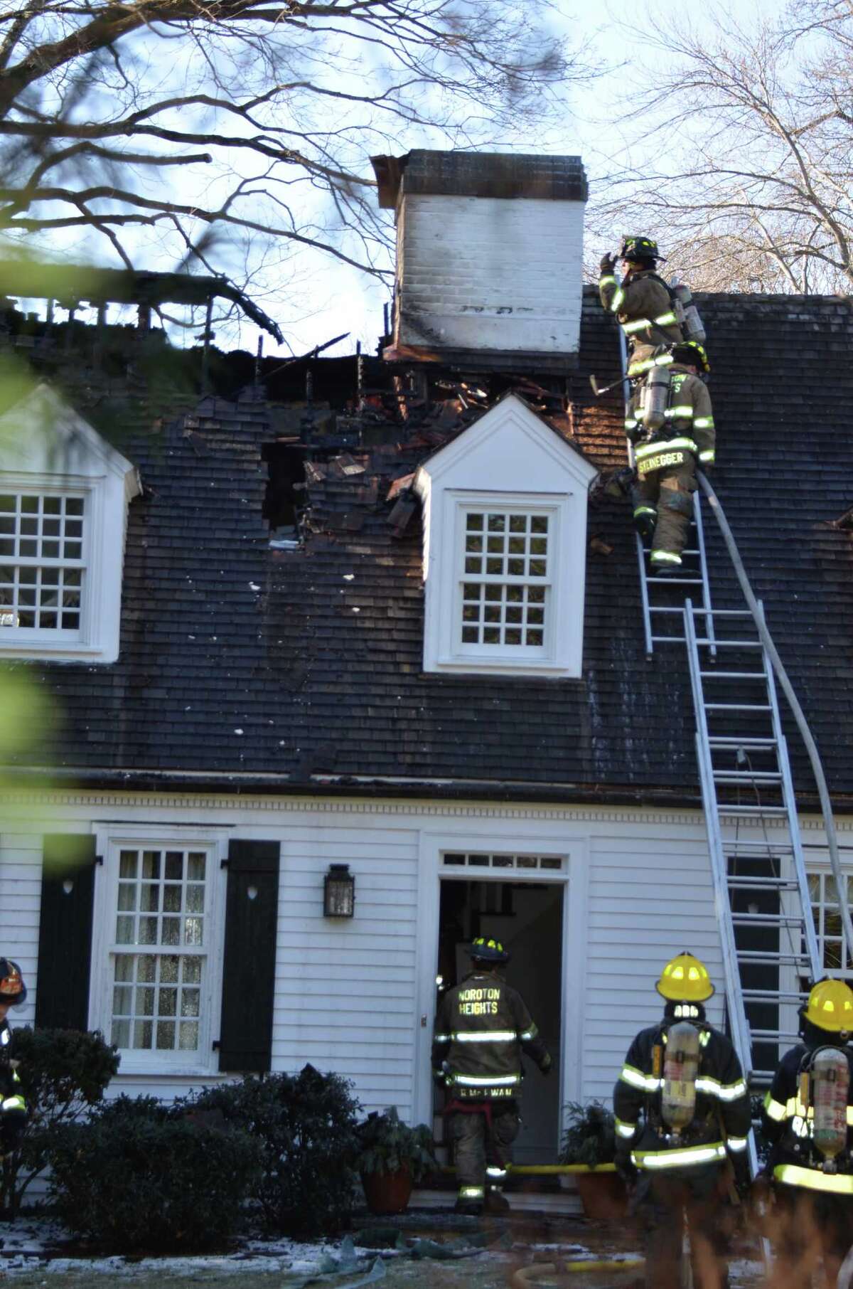 Darien home badly damaged in fire