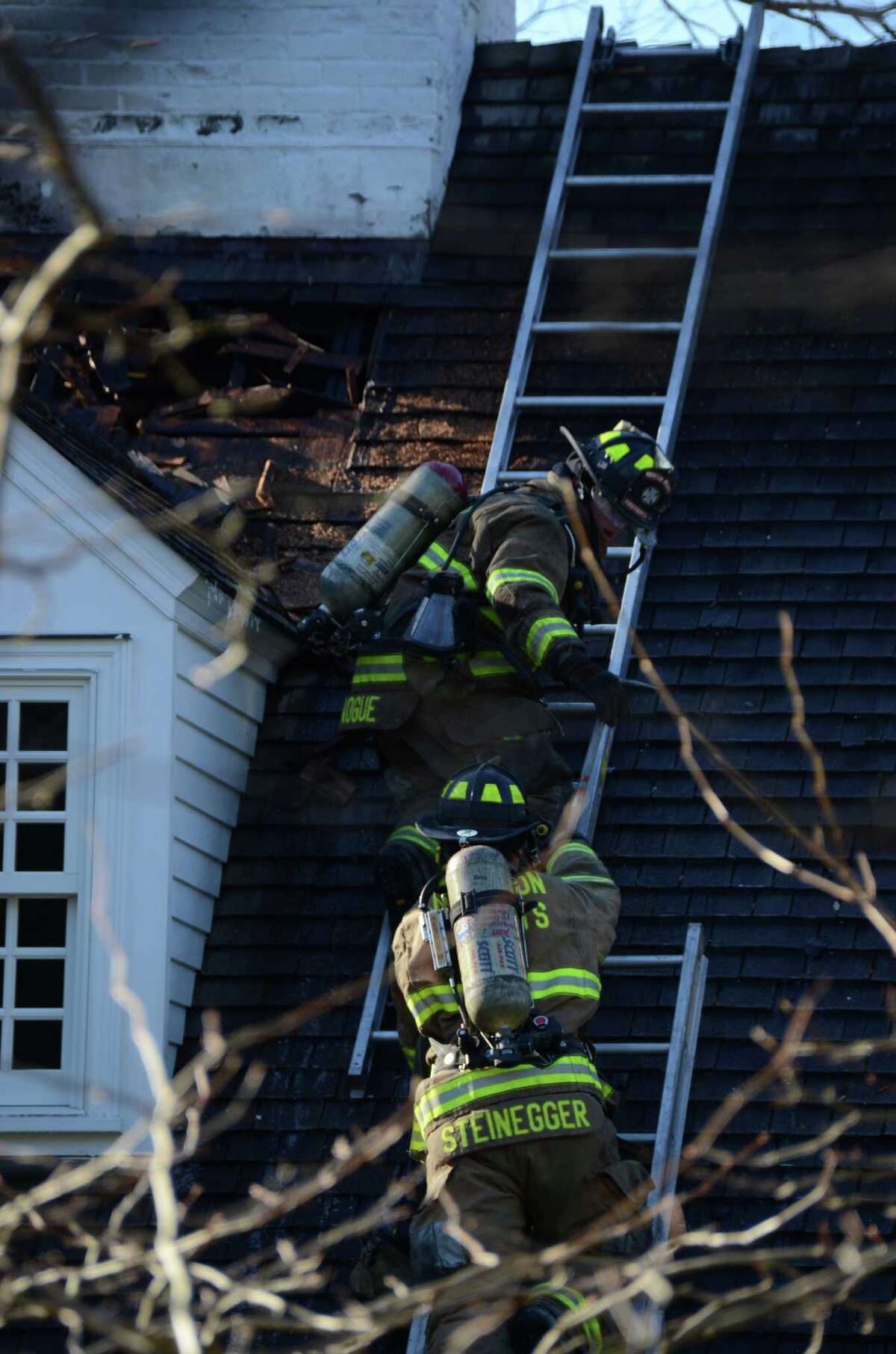 Darien home badly damaged in fire
