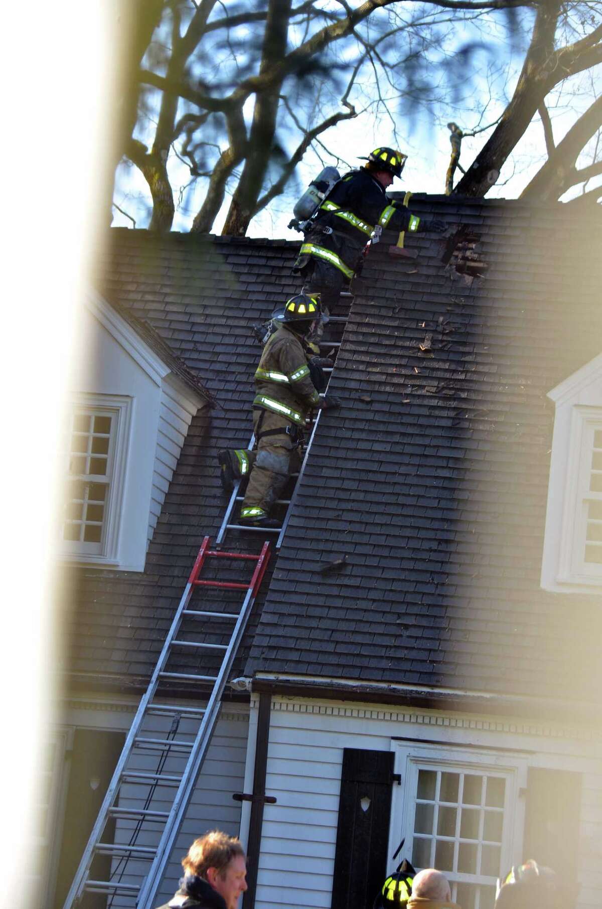 Darien home badly damaged in fire