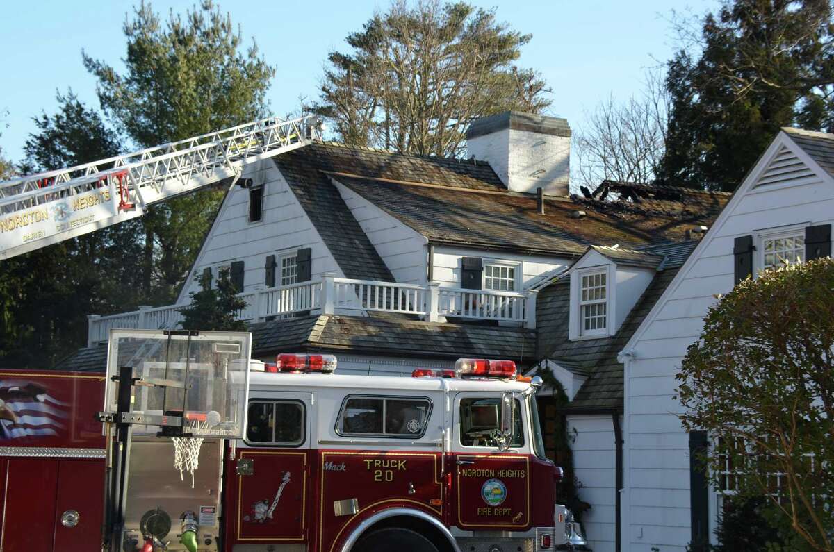 Darien home badly damaged in fire