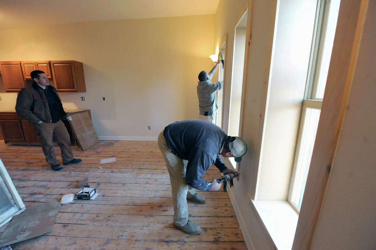 Work continues on the River Street Lofts in the old Nelicks Furniture building on Wednesday Jan. 8, 2014 in Troy, N.Y. (Michael P. Farrell/Times Union)