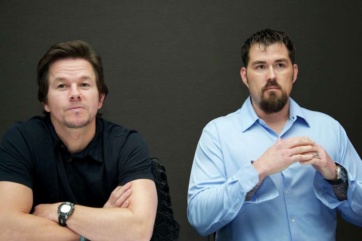 Mark Wahlberg and Marcus Luttrell at the 'Lone Survivor' Press Conference at Mandarin Oriental Hotel on December 6, 2013 in New York City.