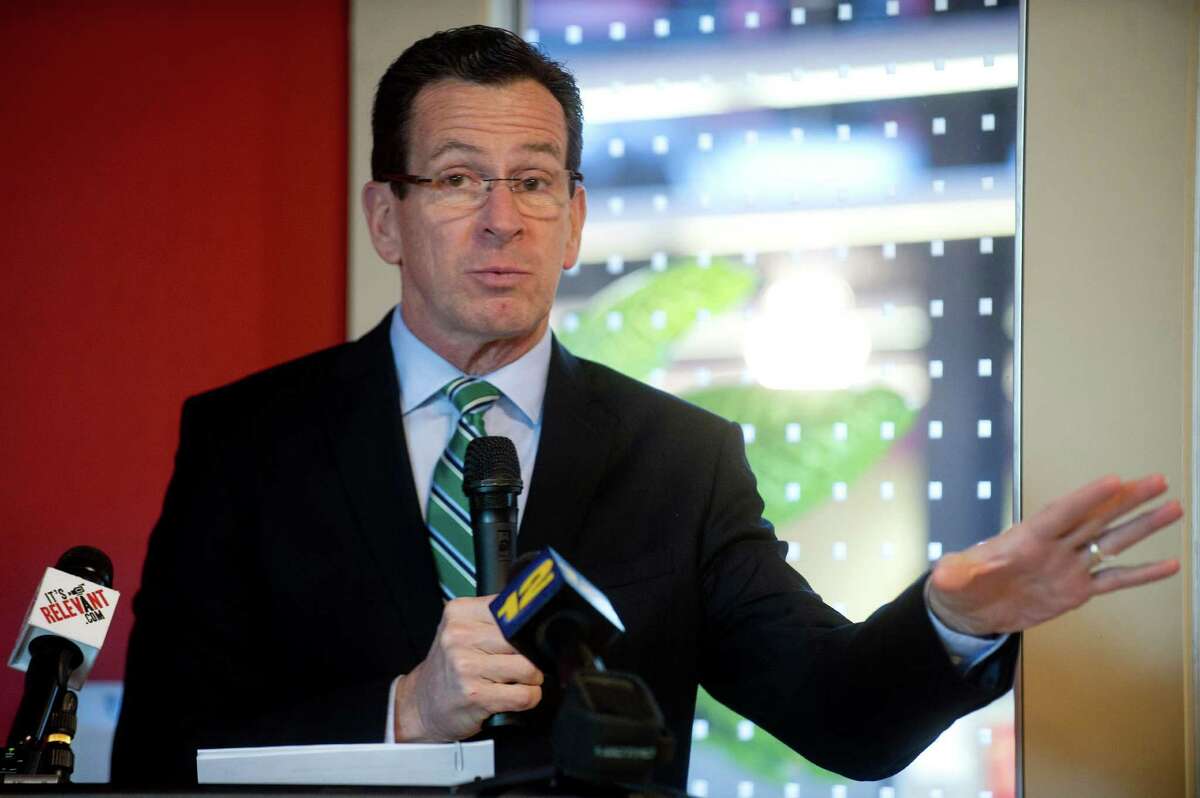 Governor Dannel Malloy speaks during the ribbon cutting ceremony for AmeriCares' Free Clinic of Stamford at the organization's headquarters in Stamford, Conn., on Thursday, January 9, 2014.