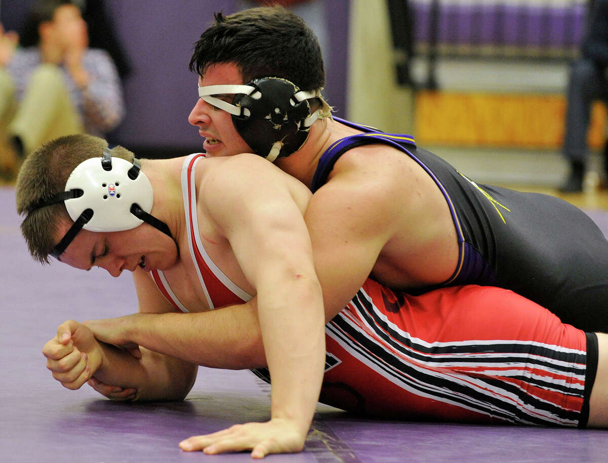 Westhill's Issac Chevron wrestles Greenwich's Thomas Williams in the 182-pound weight class during their wrestling match at Westhill High School in Stamford, Conn., on Thursday, Jan. 9, 2013.