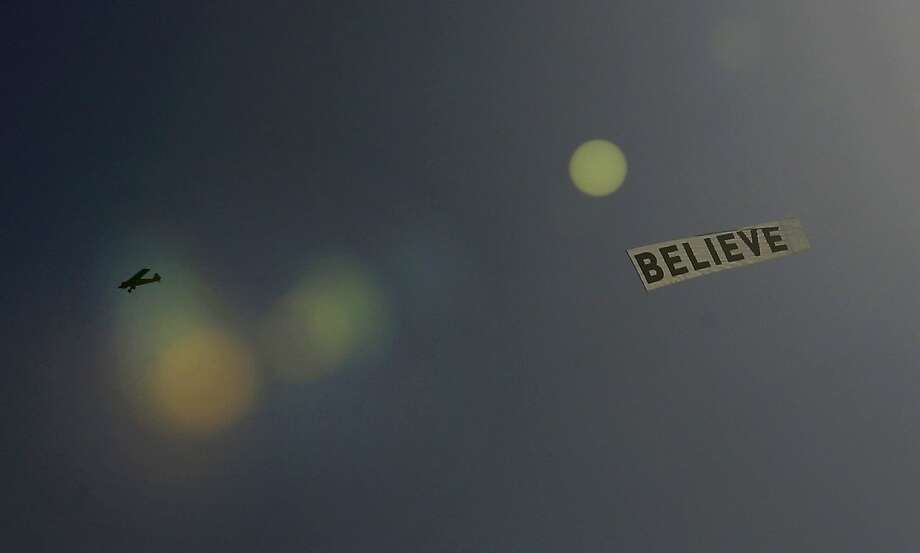 Plane banner"My husband had a plane fly a banner saying 'Faith, Will you marry me?' over the Kemah boardwalk. I said yes 14 yrs ago." - Contributed by reader Faith Wilmore Photo: Gerald Herbert, Associated Press
