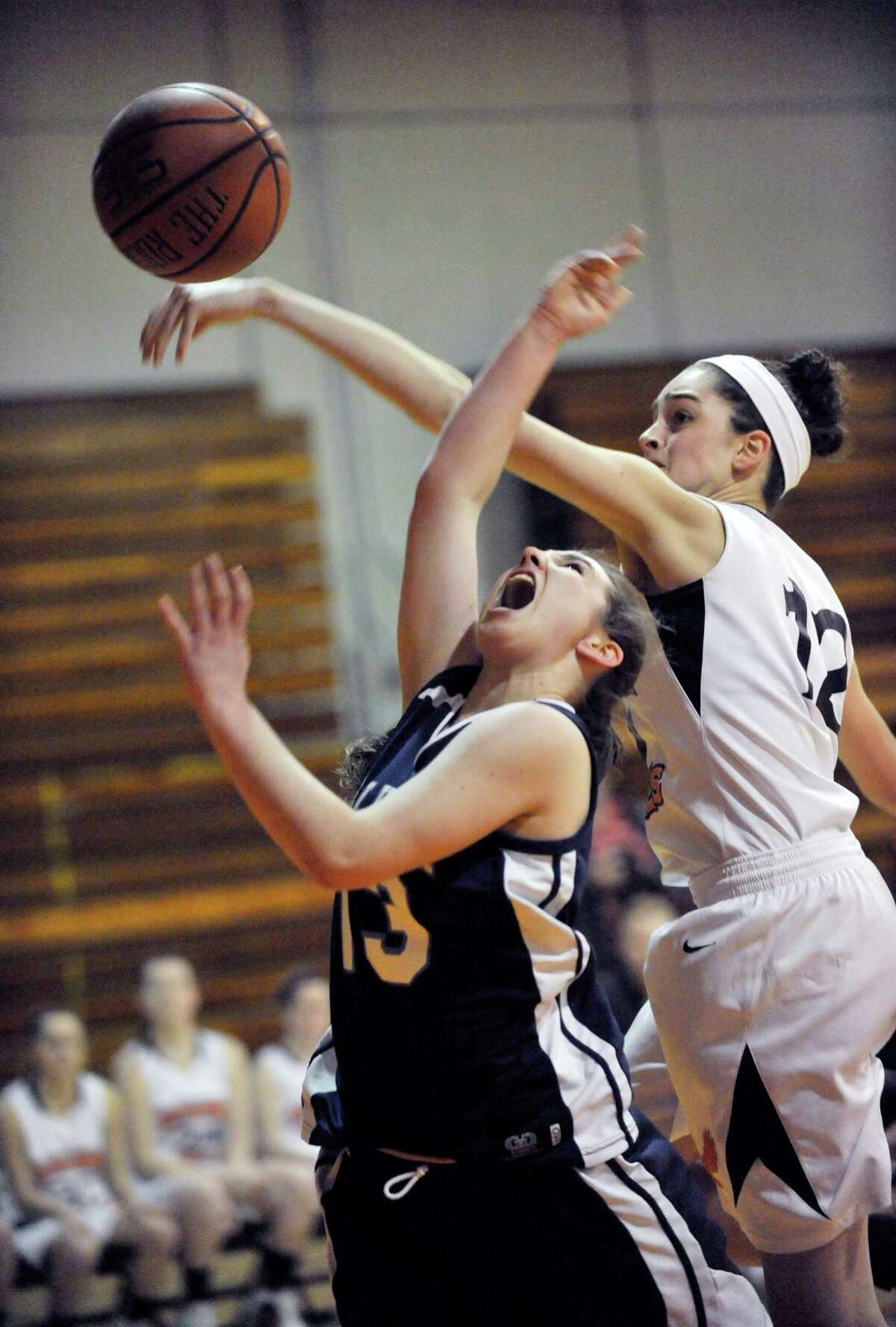 Columbia's Sarah Jaromin ,left, is defended by Bethlehem's Jenna Giacone during their girls' basketballl game in Delmar, N.Y., Friday, Jan. 10, 2014. (Hans Pennink / Special to the Times Union) ORG XMIT: HP101