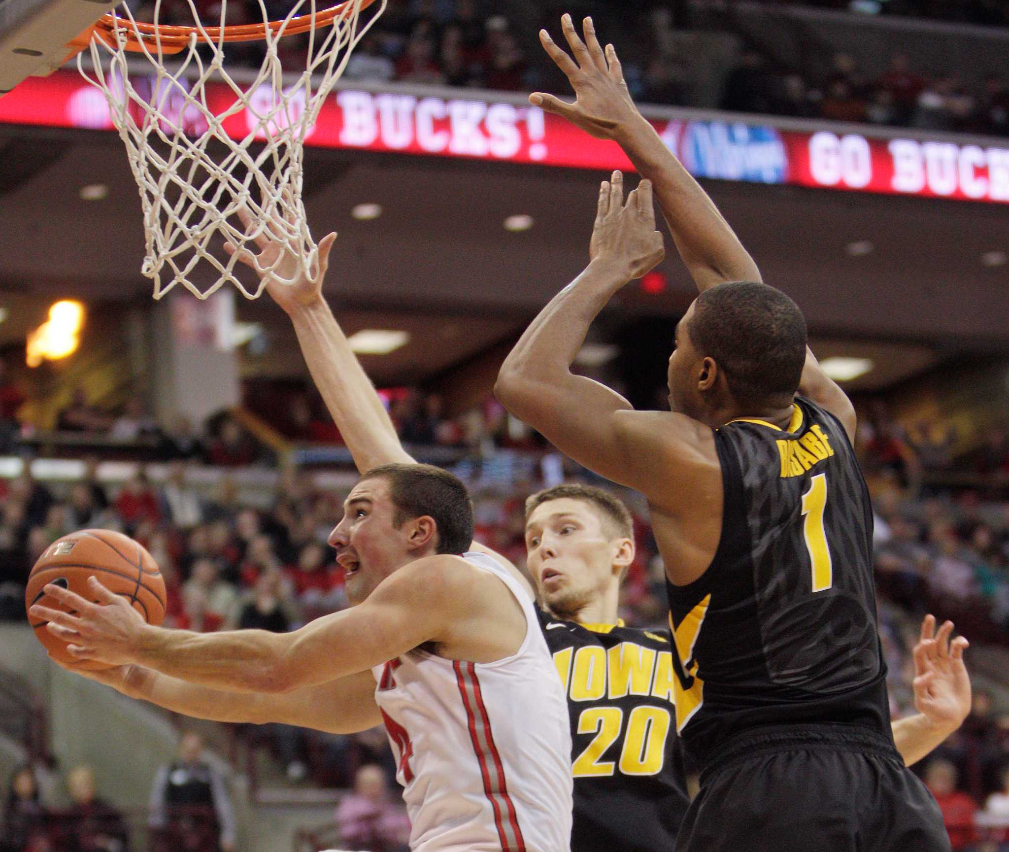 College basketball No. 20 Iowa upsets No. 3 Ohio State