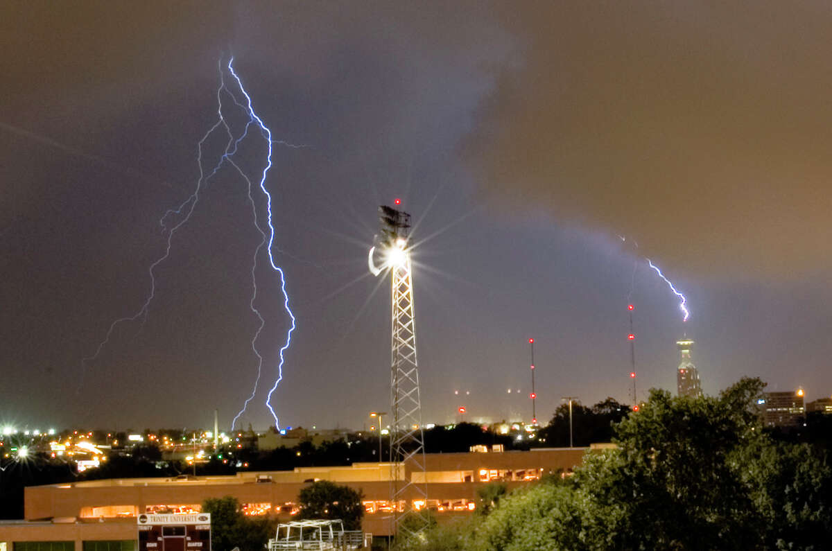 Lightning strikes downtown San Antonio and the Tower of the Americas during storms that rolled through the area Sunday Sept. 17, 2006. The scene was photographed from a dorm room balcony at Trintiy University. SEAN KIENLE / COURTESY Storms on Sunday Sept. 17 brought lightening with them as they rolled through San Antonio. Trinity University.  This evening I was shooting pictures from my balcony and just happened to capture an image of the Tower of Americas being struck by lightning
