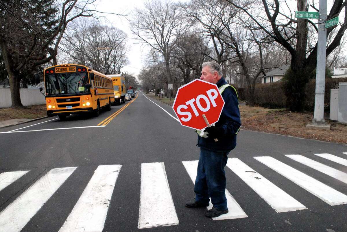 The Dart Stamford crossing guard community fixture
