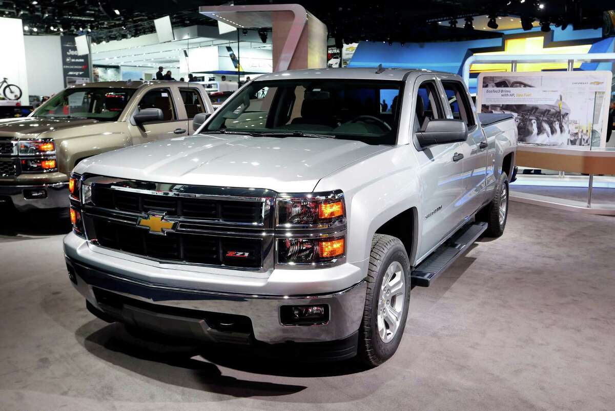 The Chevrolet Silverado has been named North American Truck of the Year at the North American International Auto Show, while the Chevrolet Corvette Stingray has been named North American Car of the Year at the North American International Auto Show in Detroit, Monday, Jan. 13, 2014.