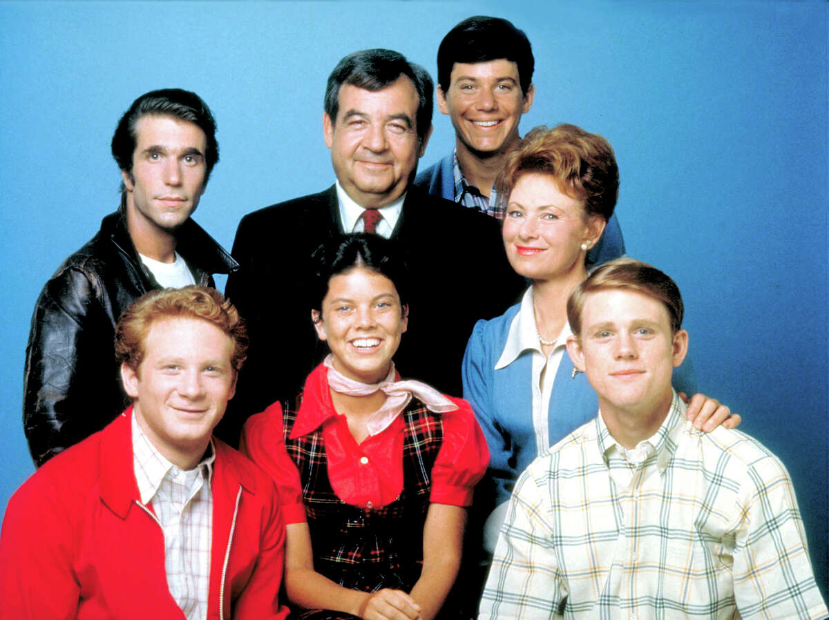 The cast of Happy Days pictured, top row, left: Henry WInkler (Fonzie), Tom Bosley (Howard), Anson Williams (Potsie), Marion Ross (Marion); bottom row, left: Donny Most (Ralph), Erin Moran (Joanie), Ron Howard (Richie), (Photo by ABC Photo Archives/ABC via Getty Images)
