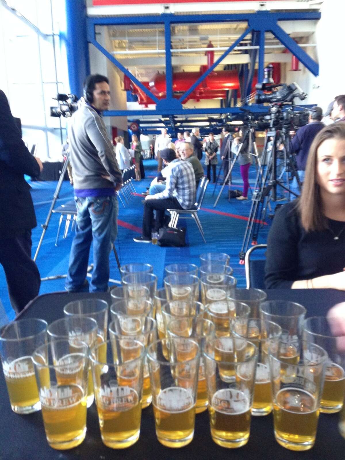 Organizers of the news conference set out glasses with Saint Arnold beer for a post-announcement toast.
